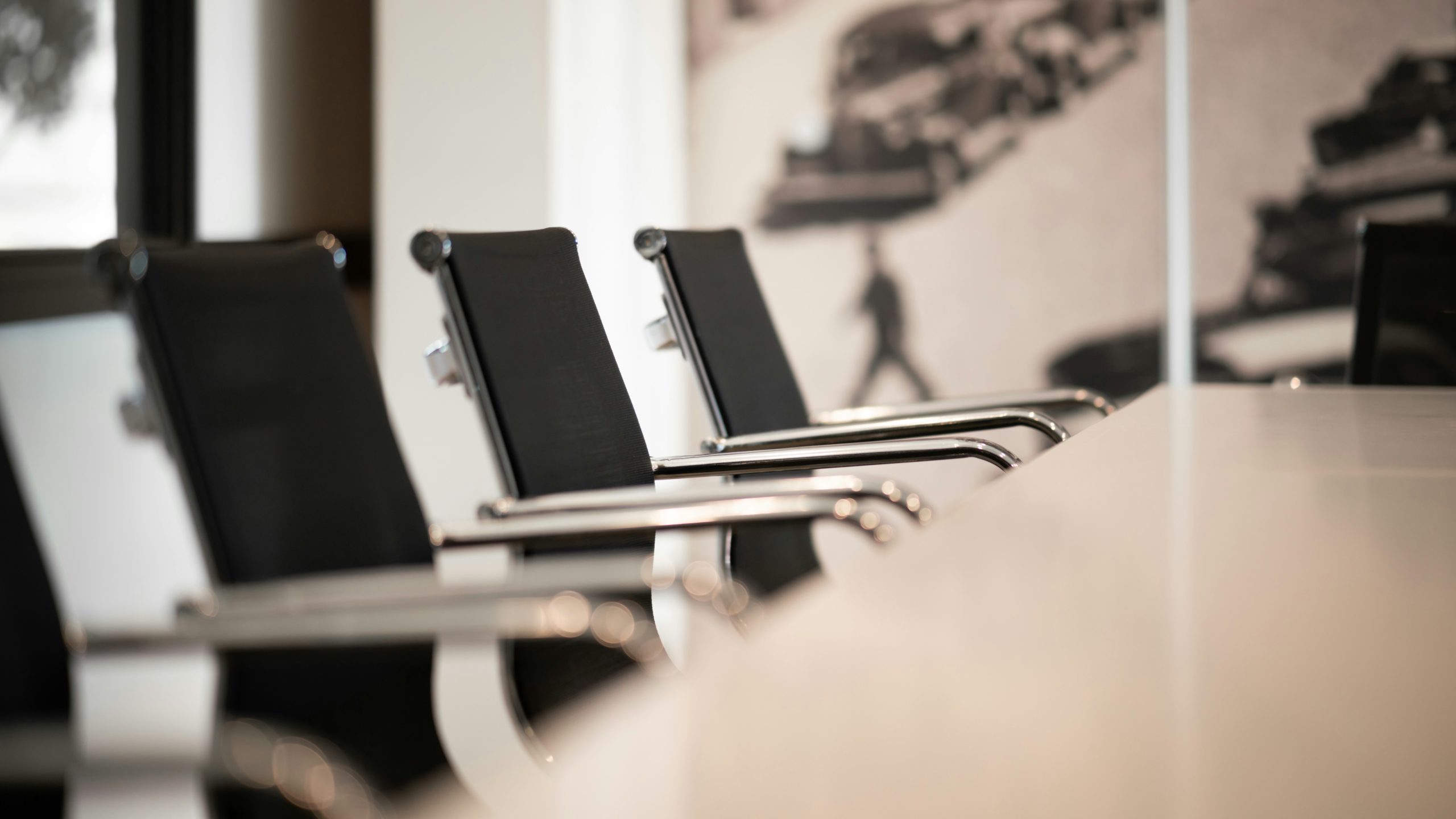 Executive board meeting room with a table and chairs