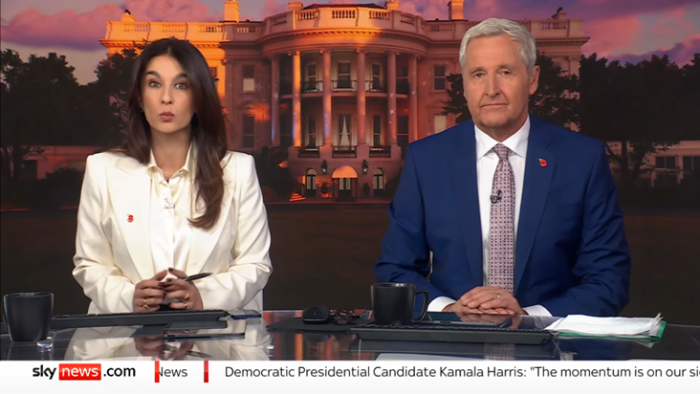 Yalda Hakim and Mark Austin sit at a desk presenting Sky's election coverage.