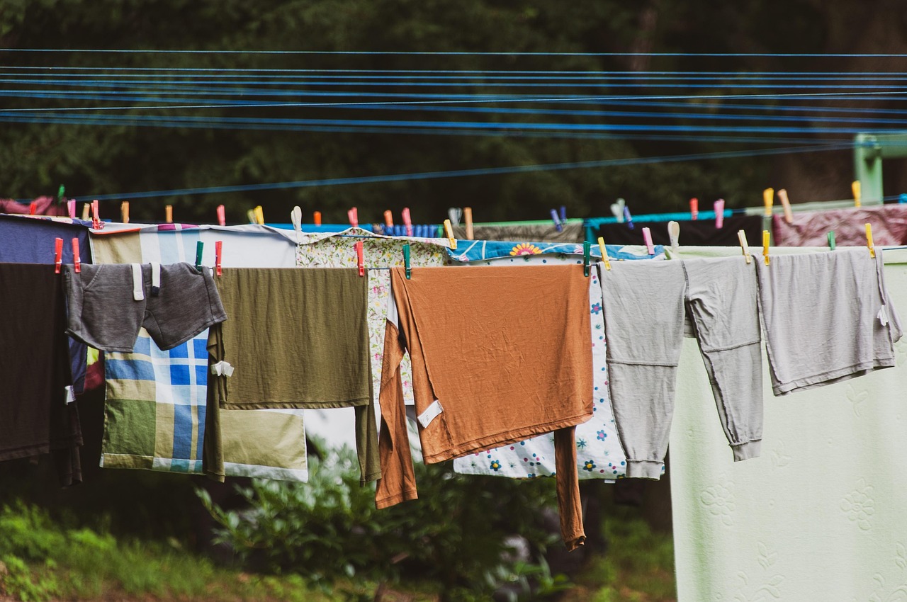 A clothes line in use in a garden.