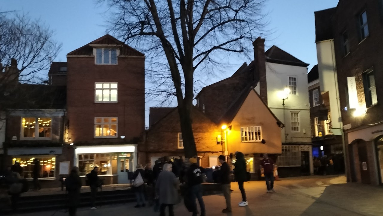 Camera crews film a TV show outside the Duke of York pub.