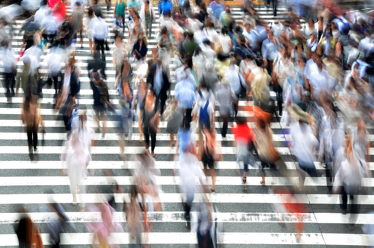 blur of pedestrians walking up steps